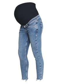 Äitiysfarkut, joissa on tumma stretch-kangashame ja vaaleansininen denim. Farkuissa on kapea malli ja revitty helma nilkoissa.