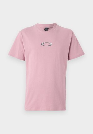 Pink cotton t-shirt with a crew neckline and short sleeves, featuring a silver oval logo on the chest. Smooth texture and simple design.