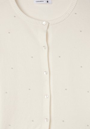 Cardigan bianco realizzato in materiale morbido, con collo rotondo, chiusura con bottoni a lunghezza totale e dettagli decorativi con perline sparse.