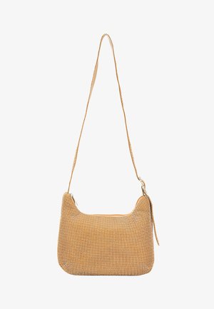 Houndstooth-mønsteret taske i gul og brun, med en blød læderrem og lynlåslukning. Rund form med en tekstureret overflade.