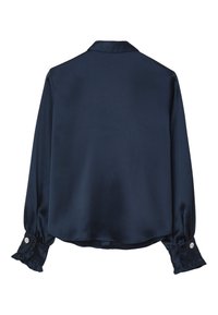 Navy blue satin blouse with a smooth texture, long sleeves, and ruffled cuffs featuring floral accents on the button. Classic collar design.