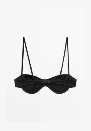 Sort underwired bh med tynde justerbare stropper, vist fladt på en hvid baggrund, som viser baglukning og syningsdetaljer.