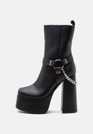 Koi Footwear, NATRON PLATFORM HEELED CHAIN BOOTS - Botines con plataforma - black
