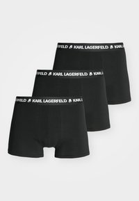 Caleçons boxers noirs en tissu doux, avec une ceinture blanche contrastante portant le logo "KARL LAGERFELD", au total trois paires.