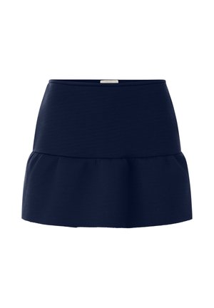 Tumesinist miniseelikut, millel on lai vöökoht ja kerge volang detail ääres, esitletakse valgel taustal.