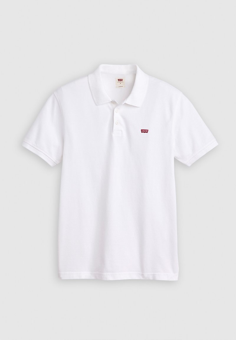 Polo blanc à manches courtes avec col et deux boutons, avec un petit logo rouge Levi's sur la poitrine gauche.