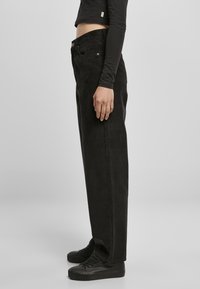 Urban Classics LADIES HIGH WAIST 90´S WIDE LEG CORDUROY PANTS - Kalhoty - black