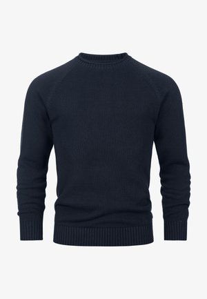 Tummansininen neulepaita pyöreällä kaula-aukolla, ribbaidoilla hihoissa ja helmassa. Ominaisuuksina siistit linjat ja sileä rakenne kauttaaltaan.