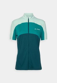 Kortärmad cykeltröja i teal och ljusblå, med dragkedja fram, krage och logotyp på vänster bröst. Mjuk, elastisk väv.