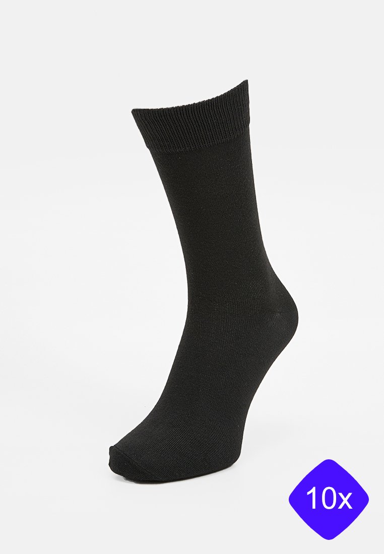 Chaussettes noires en coton avec un bord côtelé, longueur mi-mollet, texture lisse, et indication de paquet de 10 dans le coin.