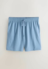 Shorts décontractés bleu clair avec taille élastique et cordon à l'avant, posés à plat sur un fond neutre clair.