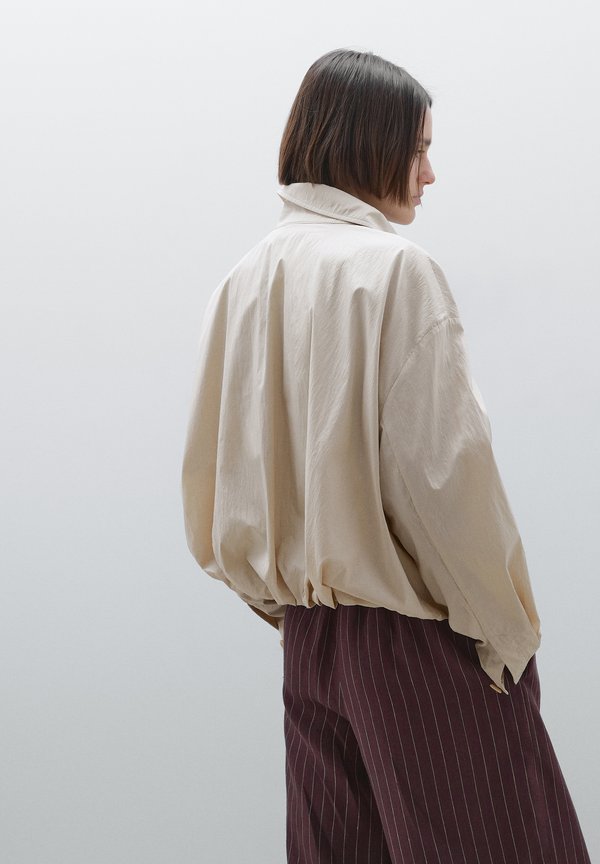 WITH SEAMS AND GATHERING  - Leather jacket2