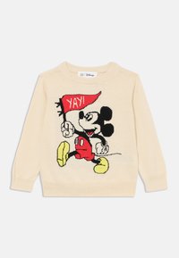 Gehaakte trui in crème met een kleurrijk Mickey Mouse ontwerp dat een rode vlag vasthoudt met "YAY!" in het wit. Geribbelde manchetten en zoom.