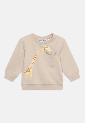 Sweat-shirt beige pour tout-petit à manches longues, avec un motif de girafe tendant la patte vers une poche poitrine ornée de feuilles vertes.