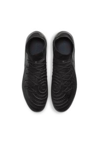 Scarpe da atletica nere con una parte superiore in maglia testurizzata caratterizzata da motivi circolari, lacci e un sottopiede imbottito. Design della suola piatta.