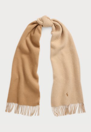 Knit scarf featuring two-tone color gradient in light brown and beige, with fringed ends and a small logo embroidered near the edge.