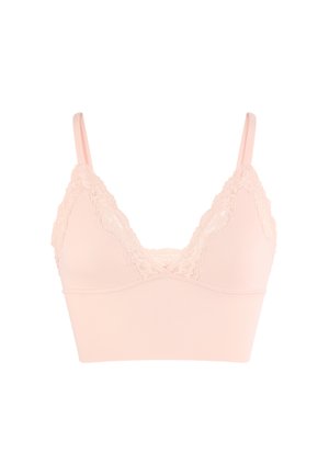 Reggiseno morbido rosa chiaro con bordo in pizzo, coppe a triangolo e spalline sottili regolabili su sfondo bianco.