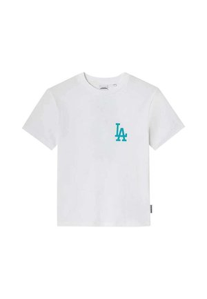 T-shirt en coton blanc avec un petit logo "LA" turquoise sur la poitrine gauche, manches courtes et col rond.