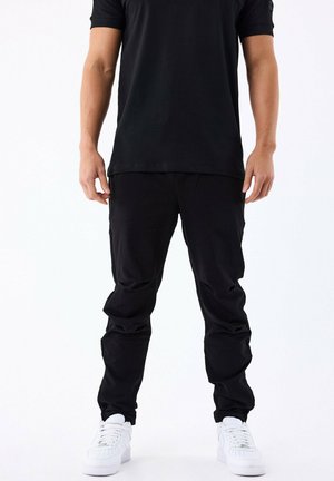 TECHNIQUE - Pantalon classique - noir