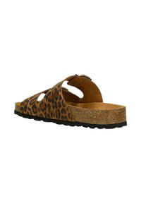 Leopardenmuster-Sandalen mit Korksohle, die über Aussparungen, einen geschwungenen Riemen und ein strukturiertes braunes Obermaterial verfügen. Schwarze Gummi-Außensohle.