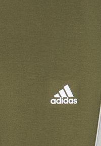 adidas Sportswear 3 STRIPES - Leggings - focus olive/white