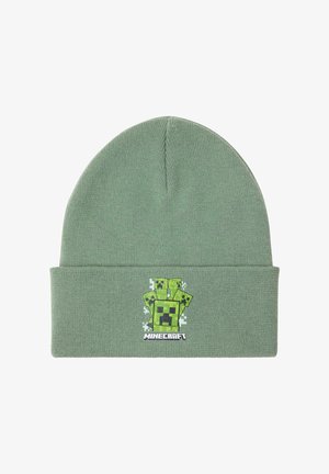 Grøn strikket hue med en Minecraft Creeper grafik i sort og grøn, med en fold-over kant og tekstureret stof.