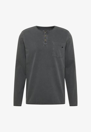 Langærmet skjorte i mørkegrå bomuld, med rund halsudskæring, tre-buttons stolpe, en brystlomme og en subtil ribbet tekstur.