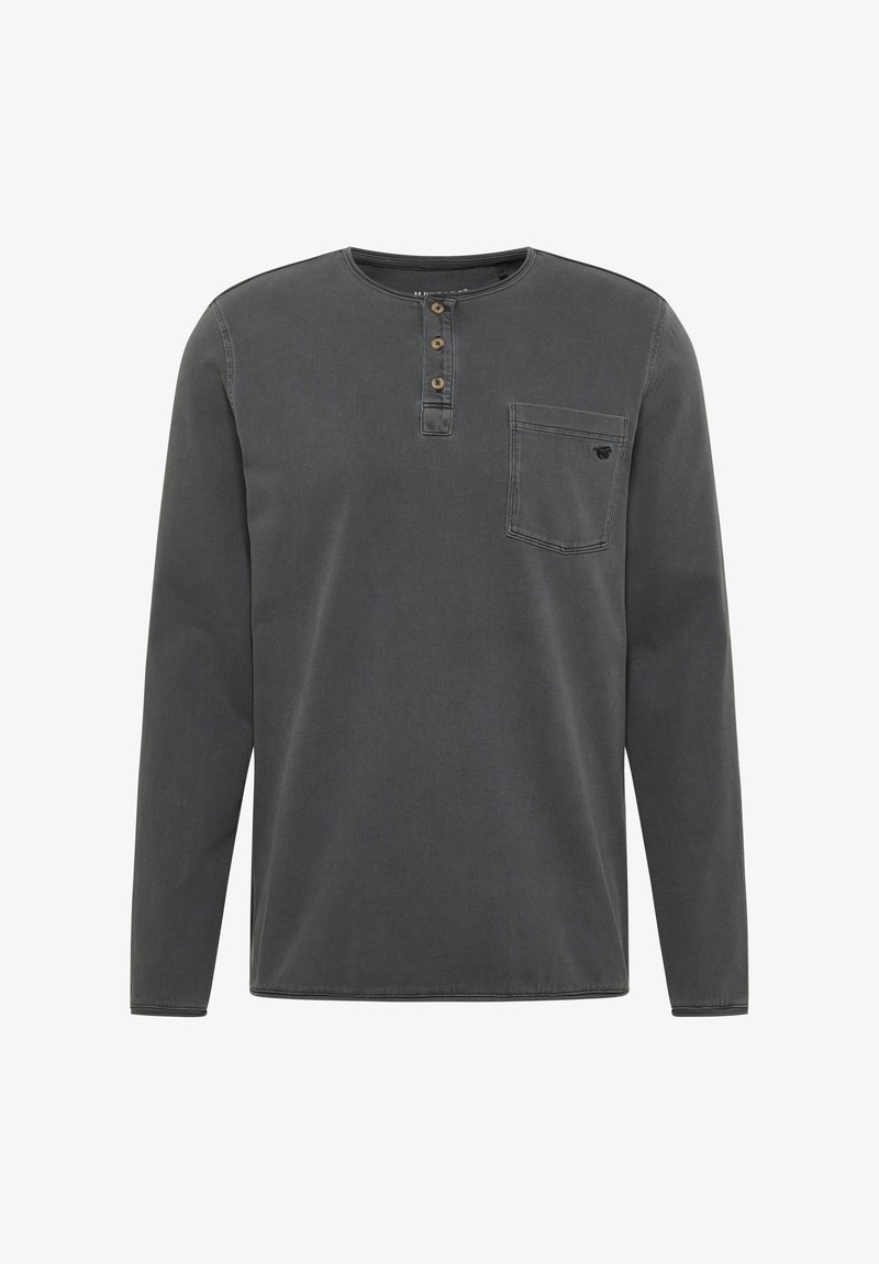 Tumehallist puuvillast valmistatud pika varrukaga särk, millel on ümmargune kaelus, kolme nupuga nööpauk, rinna tasku ja õrn sooniktekstuur.