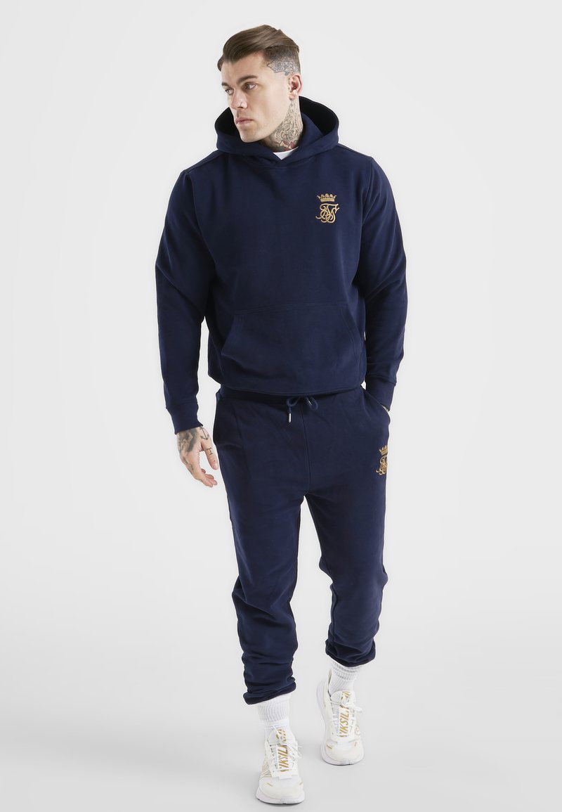 Herren Trainingsanzüge | SIKSILK MESSI Jogginghose navy/dunkelblau - NU45251 Herren Trainingsanzüge | SIKSILK MESSI Jogginghose navy/dunkelblau - NU45251