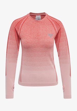 Long-sleeve performance top in gradient pink, featuring textured fabric, raglan sleeves, and a subtle logo accent on the chest.