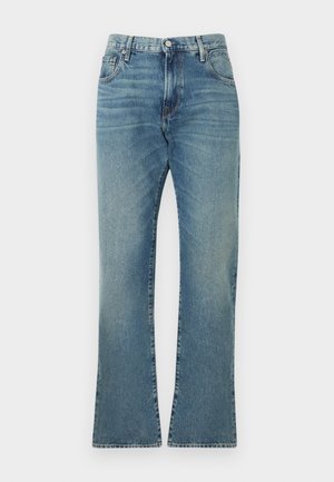 Μπλε τζιν από denim με κλασικό σχέδιο πέντε τσεπών, κλείσιμο με κουμπί και φερμουάρ, ίσια γραμμή ποδιού και διακριτική ξεθώριαση στους μηρούς και στα γόνατα.