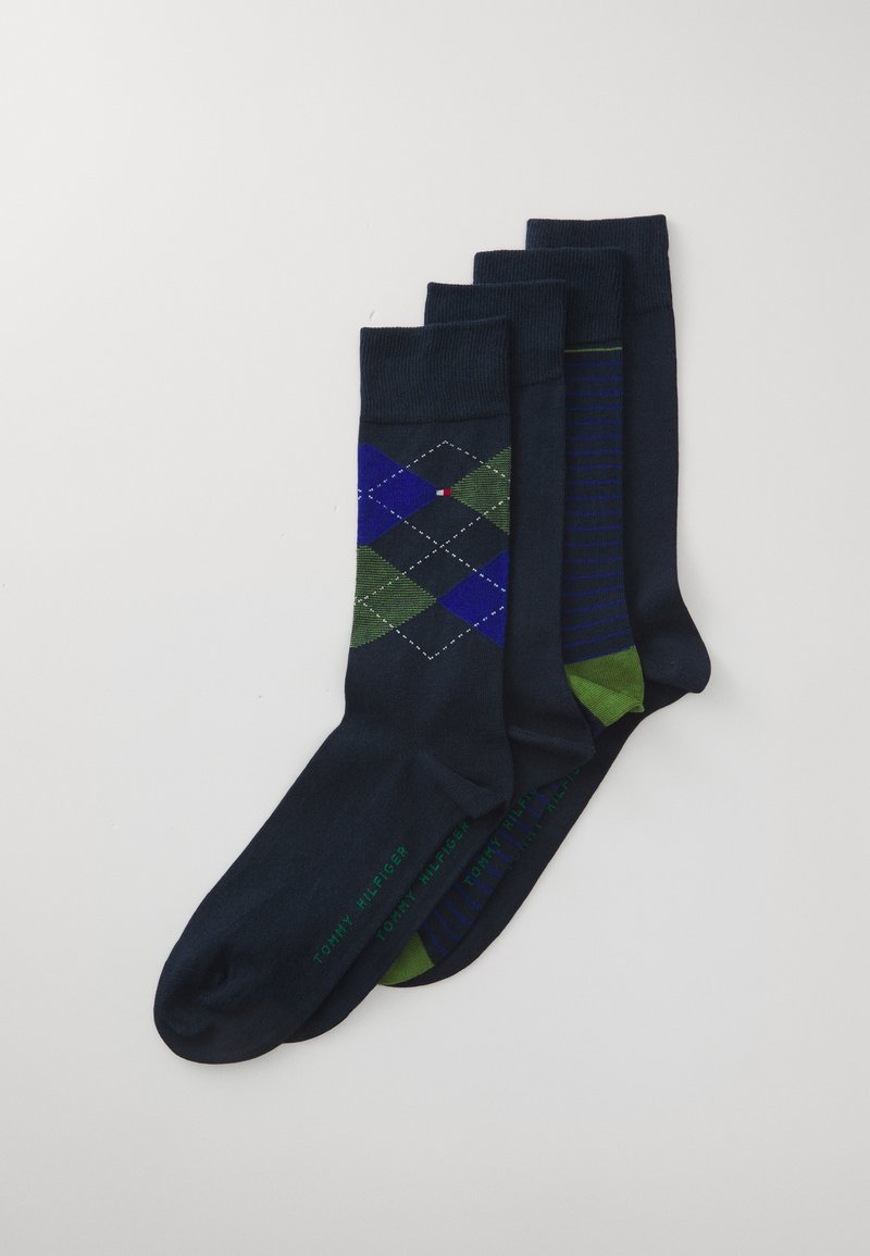 Set of four socks in various dark hues. Features include a diamond argyle pattern, stripes, and solid colors. Cotton blend material.