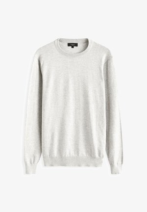 Világosszürke pulóver puha anyagból. Kerek nyakú, hosszú ujjú és bordázott mandzsettákkal és alsó szegéllyel rendelkezik. Egyszerű, díszítetlen dizájn.