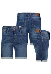 Denim shorts in a medium blue wash, featuring rolled hems, five pockets, and a leather tag on the back waistband. Classic cut and texture.