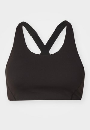 Svart sports BH med racerback-design og kryssede stropper, laget av svettetransporterende materiale og glatt tekstur.