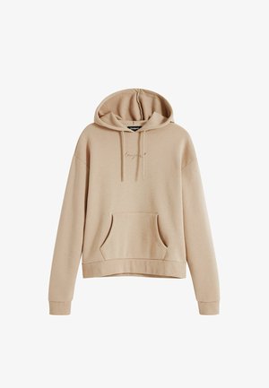 Sudadera beige hecha de una suave mezcla de algodón, con un bolsillo tipo canguro, puños acanalados y texto bordado en la parte frontal.