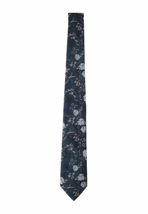 Cravate florale marine avec des fleurs et des feuilles blanches et beige sur un tissu texturé. Design slim avec une pointe effilée et une finition lisse.