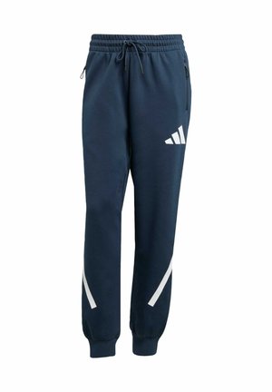 Pantaloni sportivi blu navy con vita elasticizzata e coulisse, caratterizzati da strisce bianche e dettagli con logo, realizzati in un tessuto morbido e testurizzato.
