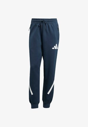 Pantaloni sportivi blu navy con vita elasticizzata e coulisse, caratterizzati da strisce bianche e dettagli con logo, realizzati in un tessuto morbido e testurizzato.