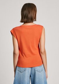 Pepe Jeans Marškinėliai su spaudiniu - sunset orange
