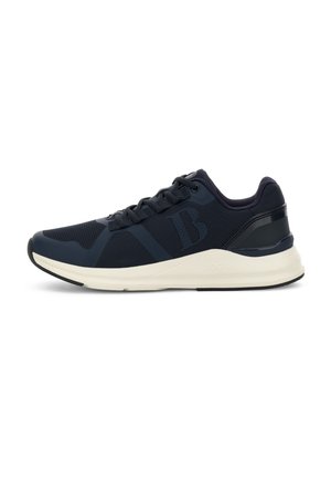 Zapato deportivo navy con una parte superior de malla transpirable, diseño texturizado, media suela blanca y suela negra. Cuenta con cordones y acentos en el talón.