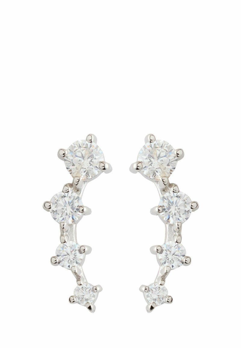 Øreringe i sølvfarve med fem klare runde krystaller arrangeret i et buet design, der viser en glat og poleret overflade.