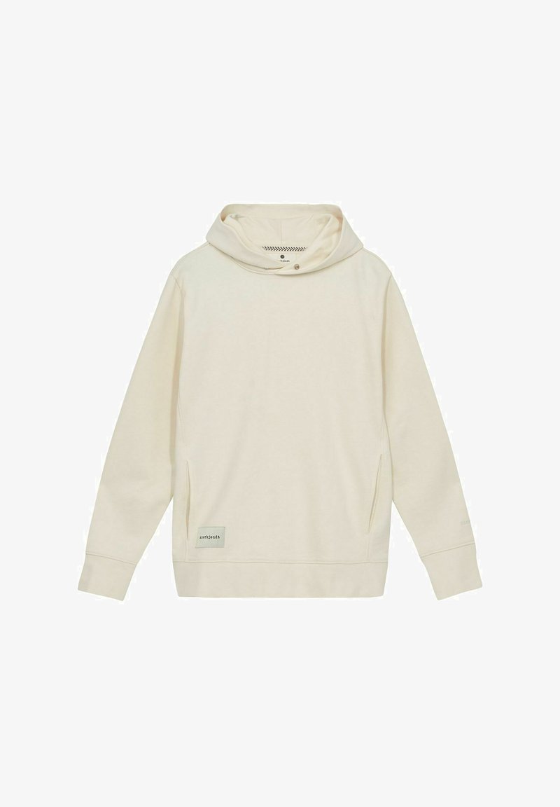 Cremfarbener Pullover-Hoodie aus weichem Stoff, mit einer großen Kapuze, seitlichen Taschen und einem kleinen Logoschild am Saum.