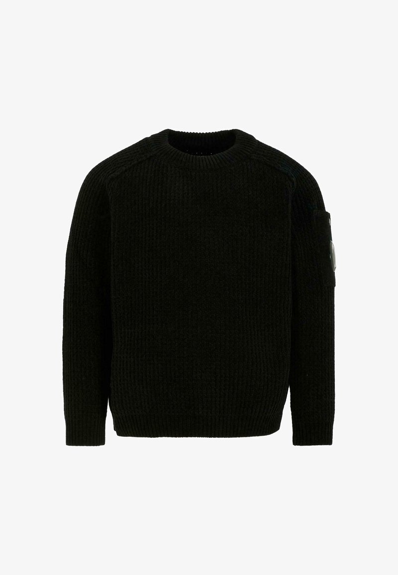 Maglione nero a costine, colletto rotondo, maniche lunghe, con una tasca con dettaglio metallico sulla manica sinistra. Texture morbida.