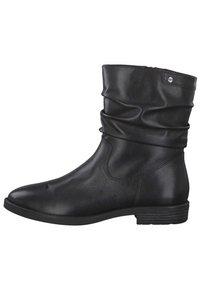 Svart läderstövel med slapp design, rundad tå och låg klack med staplad effekt. Har en slät textur och en liten dekorativ metalldetalj.