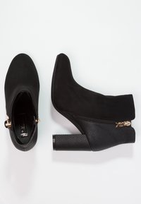 XTI Ankle boot