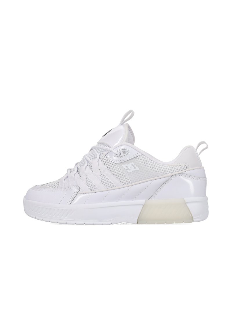 White athletic shoe featuring a mesh upper, smooth synthetic accents, and a rubber outsole with a raised heel for added support.