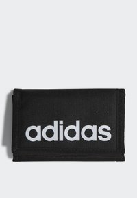 Black fabric wallet featuring a prominent white "adidas" logo. It has a rectangular shape with stitched edges and a textured surface.