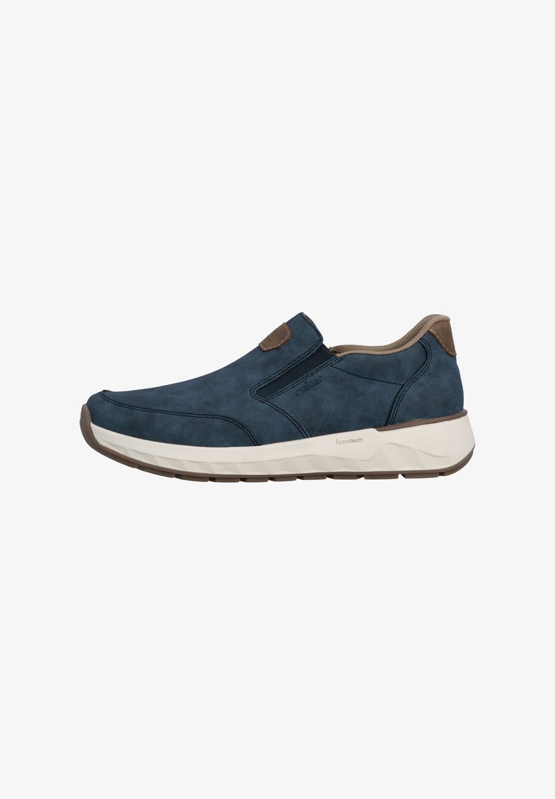 Slip-on navy blue shoes with suede-like upper, tan accents, padded collar, and contrasting light sole. Designed for comfort and ease of wear.