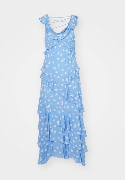 Light blue, tiered maxi dress made of soft fabric. Features ruffled layers and a floral print with thin, crisscrossed straps.